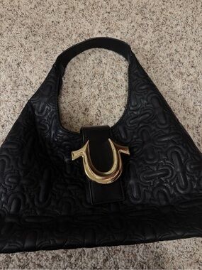Black Quilted Shoulder Bag with Gold Accent